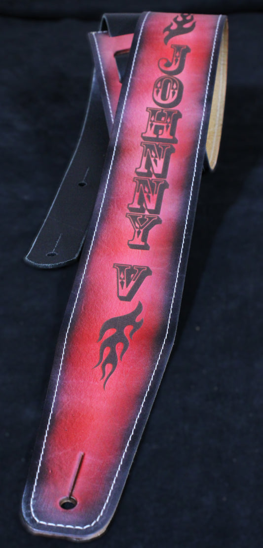 Stitched red leather guitar strap