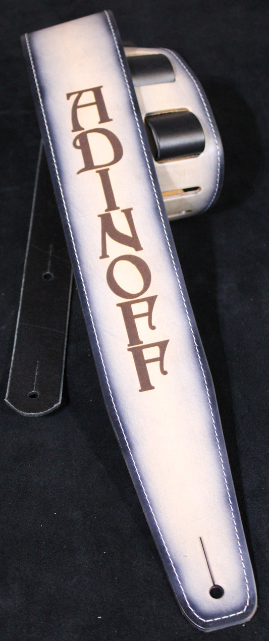 Stitched white leather guitar strap