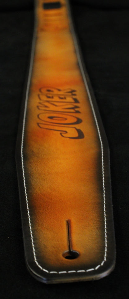 Stitched orange leather guitar strap