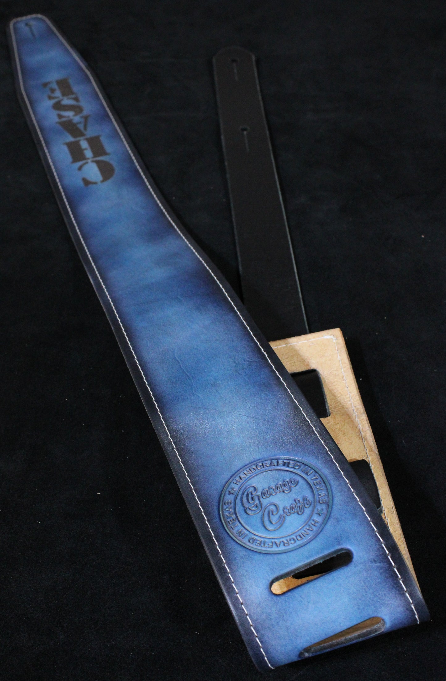 Stitched blue leather guitar strap