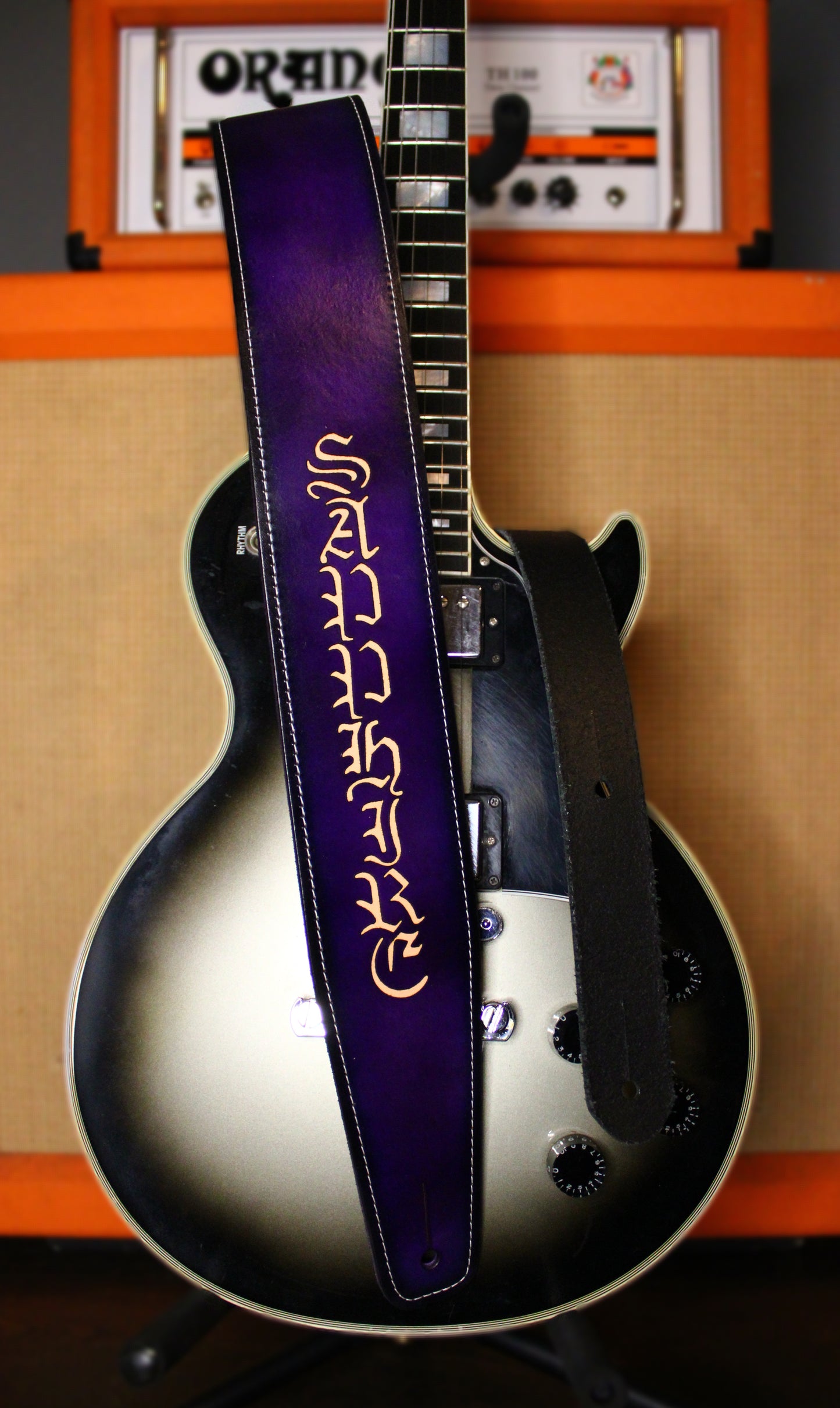 Purple leather guitar strap